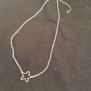 Adjustable Silvertone Open Star Necklace